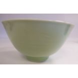 An early 20thC Chinese celadon glazed porcelain, tapered,