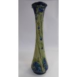 A Moorcroft pottery Florian Ware solifleur vase of slender, waisted baluster form with a flared,