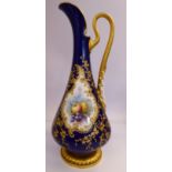 A Royal Worcester midnight blue glazed china ewer of slender, tapered, bulbous form,