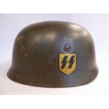 A German parachutist's helmet with a hide lining,