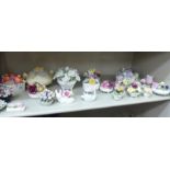 Decorative items: to include mainly Staffordshire and Coalport china flower ornaments various