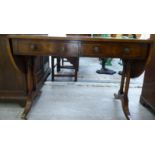 A modern burr walnut and mahogany finished sofa table with two frieze drawers,