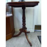 A mid 19thC mahogany pedestal table, the top with round corners,