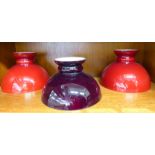 A set of three black and red coloured glass lustre light shades 9''dia SR