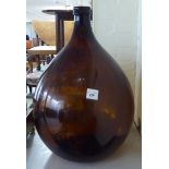 A brown glass carboy 25''h BSR