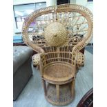 A Woodstock woven cane peacock chair;