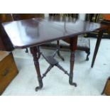 A 1930s Victorian style Sutherland table, raised on ring turned,