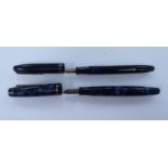 A Wearever Zenith fountain pen with a 14k gold nib; and a Parker Duofold,