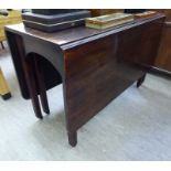 A George III mahogany drop leaf dining table,