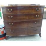 A Regency mahogany four drawer bow front dressing chest,