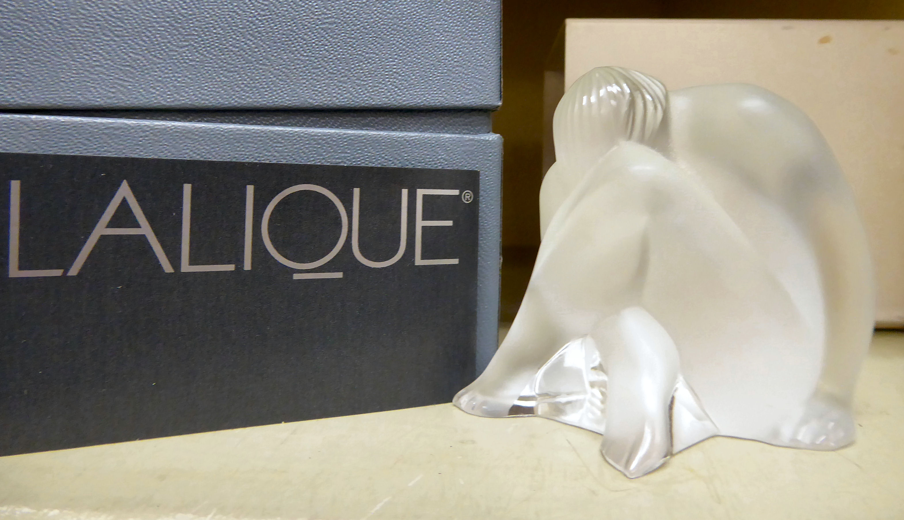 A modern Lalique frosted glass figure, a seated nude 2.