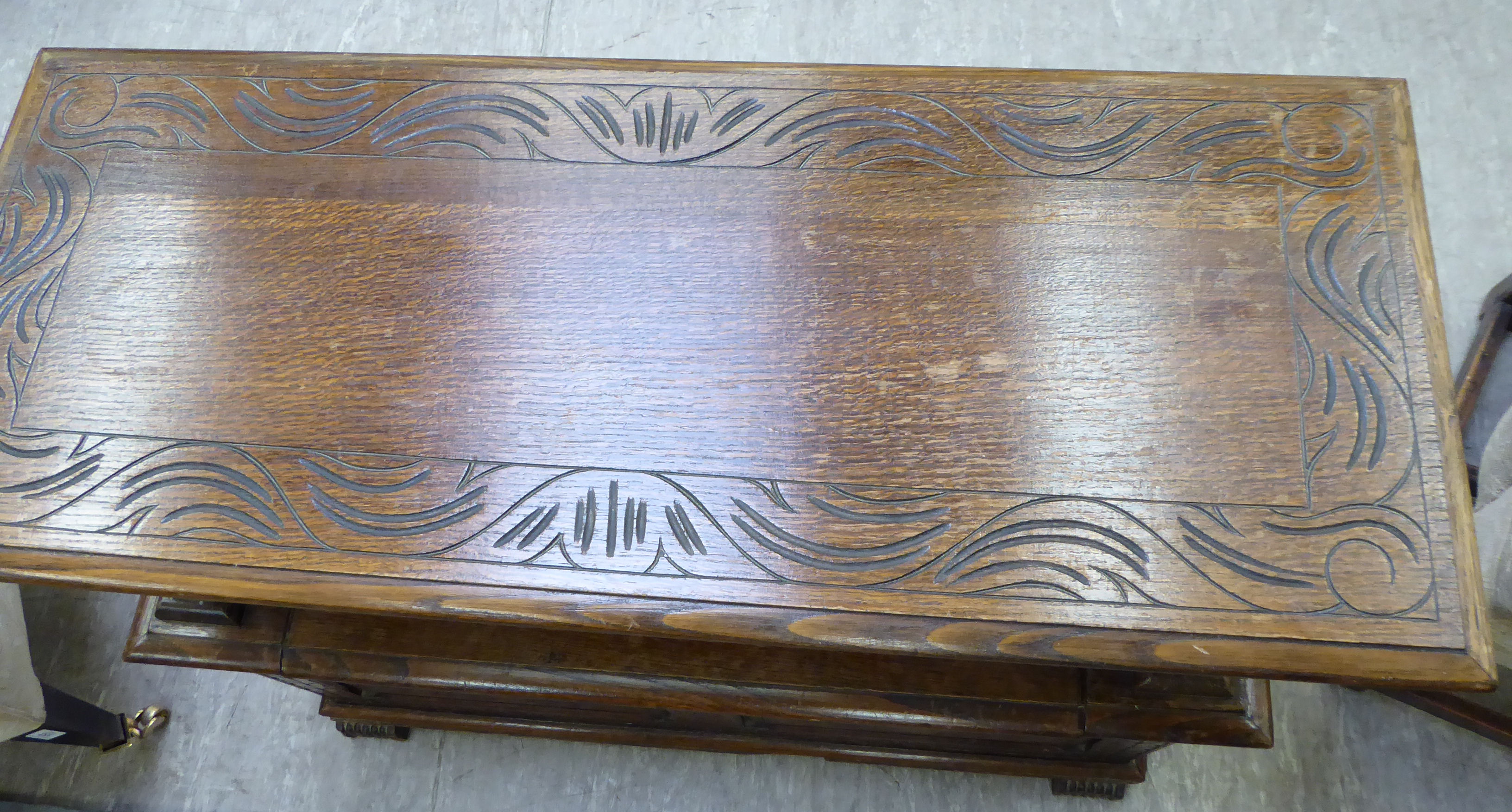 A 1920s/30s oak monk's bench with lion carved arms and a hinged seat, - Image 4 of 6