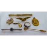 Yellow metal items of personal ornament: to include a late Victorian pendant,