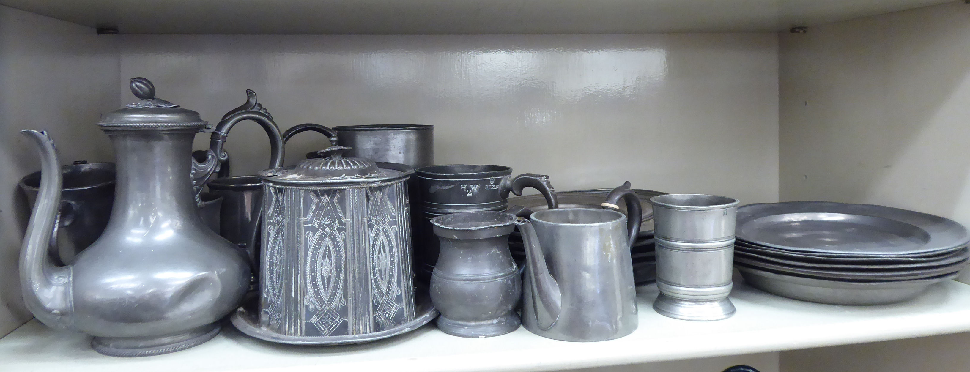 18thC and 19thC pewter tableware: to include plates 8''dia, tankards,