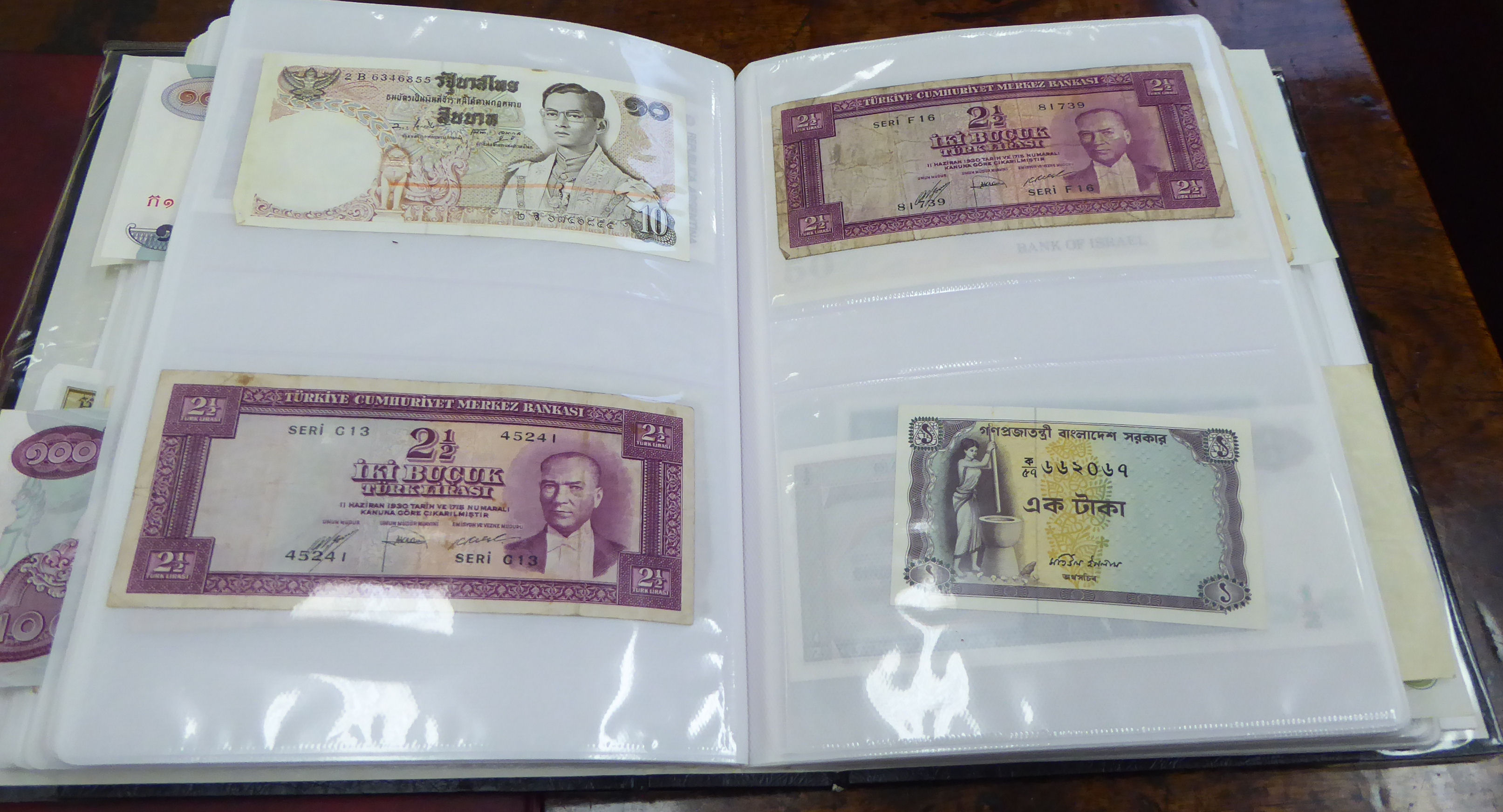 Two uncollated albums collections, containing banknotes from Peru, Uruguay, Turkey, China, Brazil, - Image 5 of 13