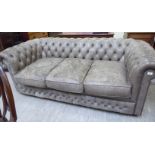 A modern three person button upholstered light brown hide Chesterfield style settee CA
