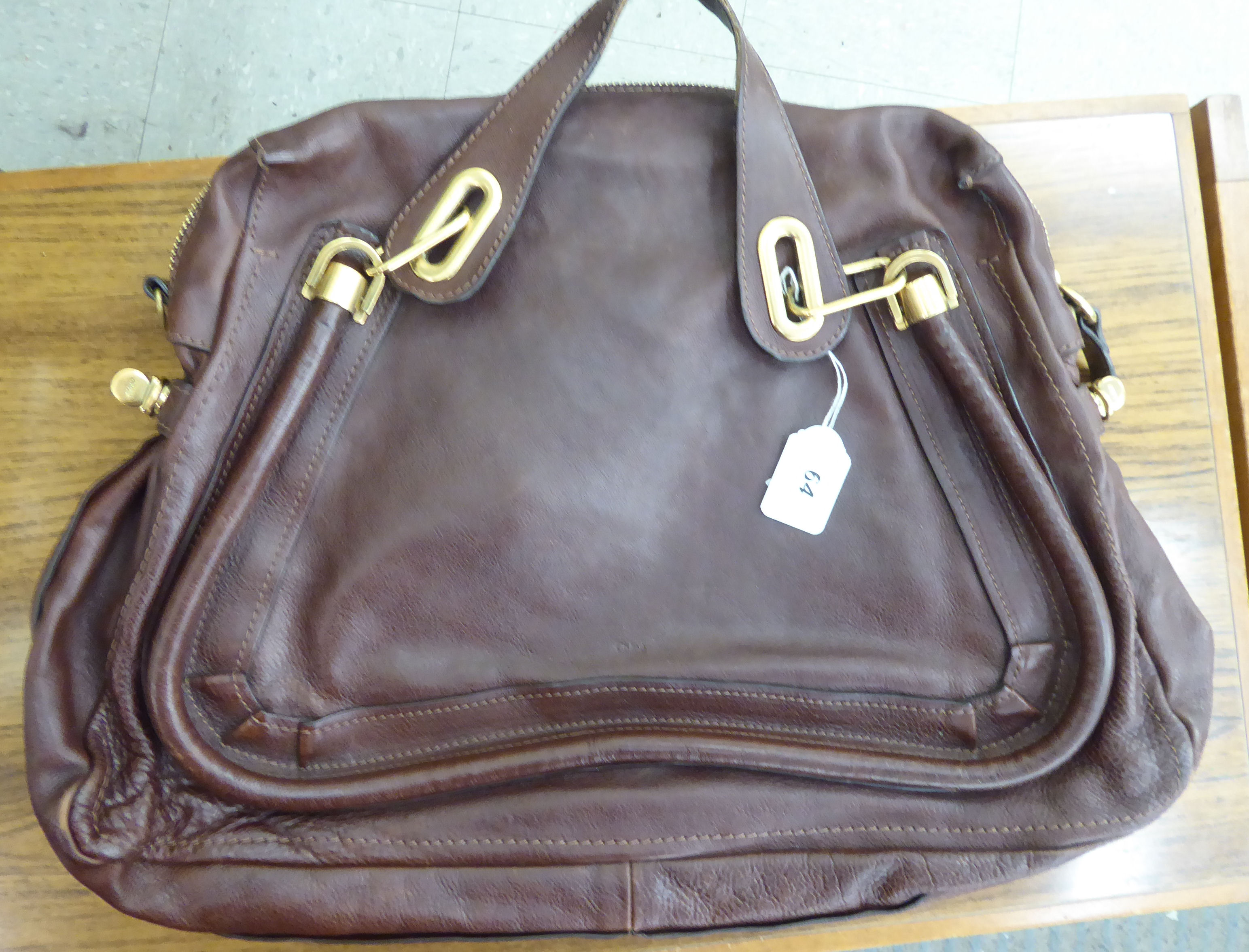 A Chloe style brown leather Paraty bag with gilt metal mounts SR