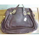 A Chloe style brown leather Paraty bag with gilt metal mounts SR