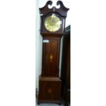 An early 19thC oak longcase clock with crossbanded and marquetry ornament,