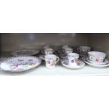 A set of six Dresden china coffee cups, five saucers and two tea cups and saucers,