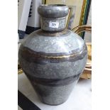 A galvanised iron vase of tapered,