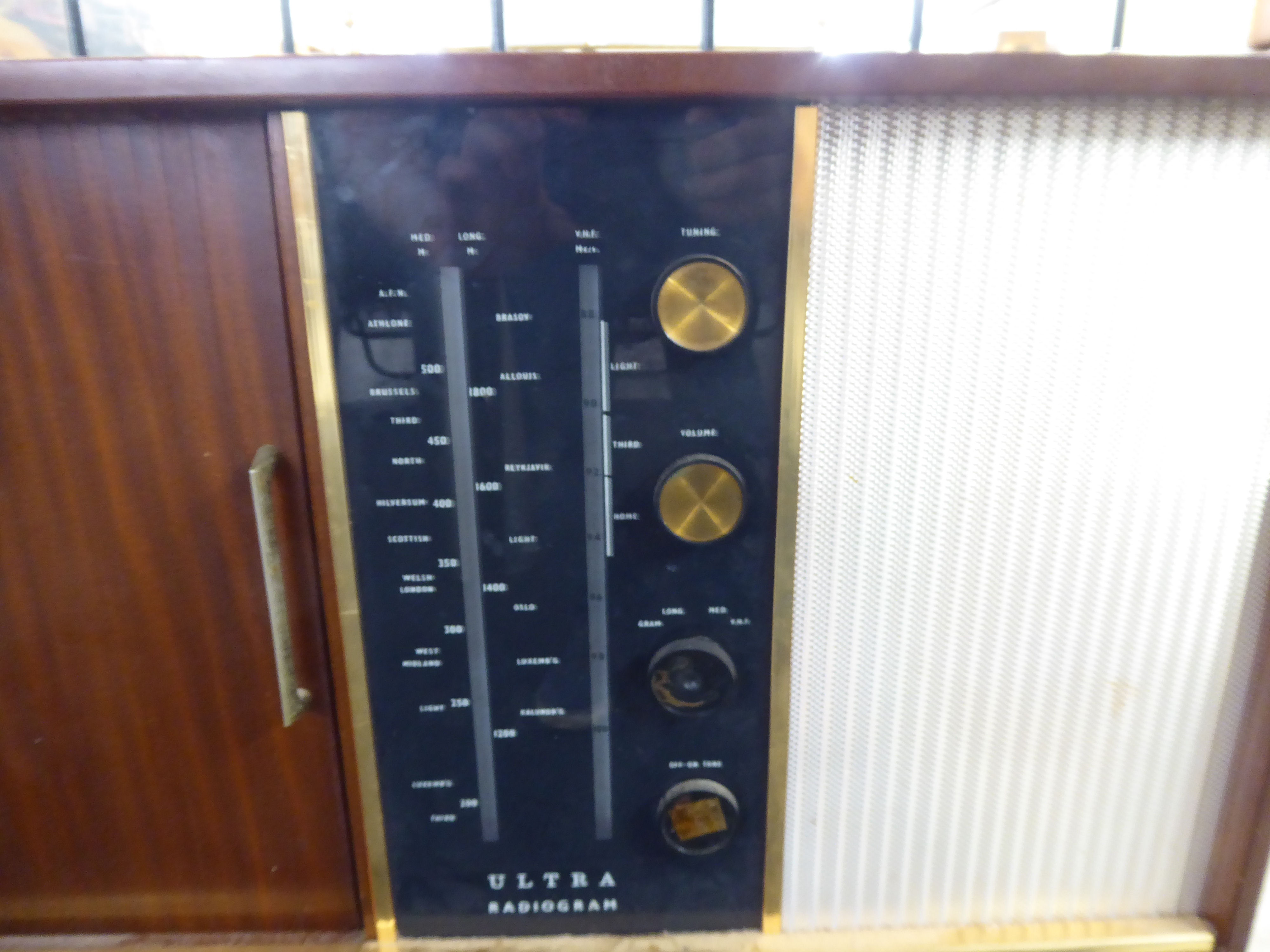 A 'vintage' mahogany finished Ultra radiogram with a sliding door, enclosing a Garrard record deck, - Image 4 of 6