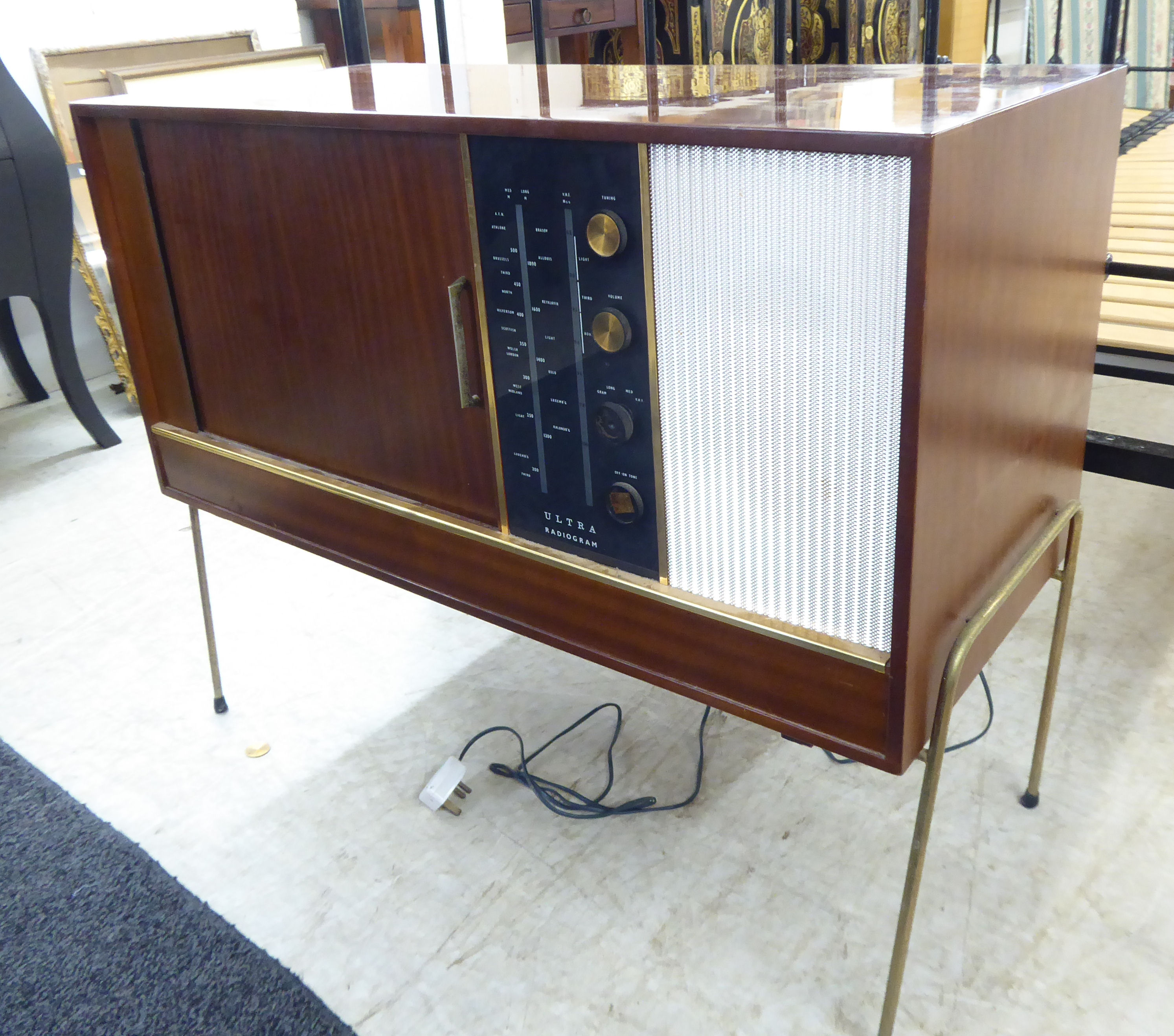 A 'vintage' mahogany finished Ultra radiogram with a sliding door, enclosing a Garrard record deck, - Image 3 of 6