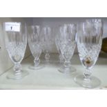 A set of six Waterford Crystal pedestal Champagne flutes OS1