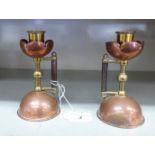 A pair of late Victorian Benam Froud, Christopher Dresser design, copper and brass candlesticks Rd.