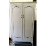 A modern white painted two door wardrobe,