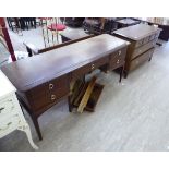 A modern Stag mahogany finished five drawer dressing table 34''h 60''w;