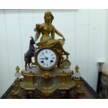 A late 19thC gilt spelter and onyx cased mantle clock,