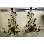 A pair of early 20thC French painted and naturalistically wrought iron, twin branch wall lights,