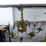 An early 20thC Dutch style lacquered brass,