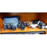 Photographic equipment: to include a Canon EOS30 with a 50mm lens and accessories SR