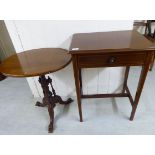 An Edwardian crossbanded string inlaid mahogany side table with a single drawer, raised on square,