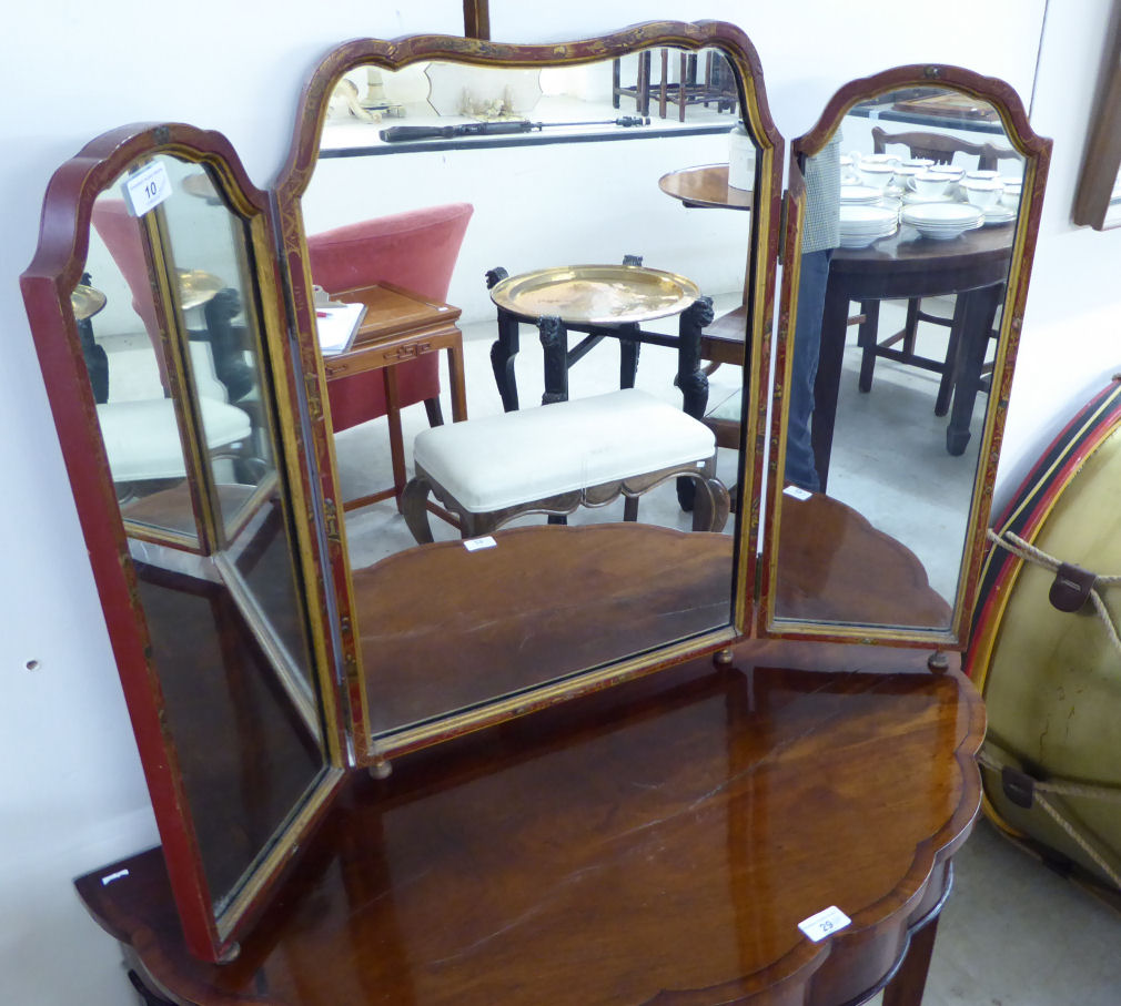 A mid 20thC Japanese inspired red lacquered and overpainted framed triptych mirror 25'' x 38''