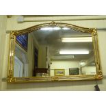 A Harrods overmantel mirror,