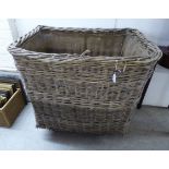 A late Victorian woven cane deep-fill laundry basket,