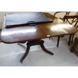 A Regency mahogany breakfast table, the top raised on a ring turned column,