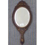 A late 19thC Southern European oval, bevelled hand mirror,