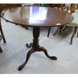 A late 19thC mahogany pedestal table, raised on a bulbous,