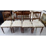 A set of four Edwardian mahogany framed dining chairs,