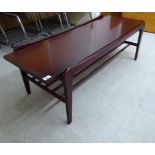 A 1970s mahogany finished beech and teak framed coffee table,