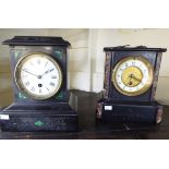 Two similar early 20thC black slate cased mantle clocks,