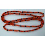 A coral bead necklace CS