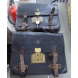 Two similar early 20thC stitched hide bound satchels/cases bears a Royal crest S