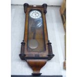 A late 19thC walnut cased Vienna regulator;