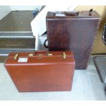 Two 'vintage' Samsonite stitched hide and card bound suitcases BSR