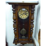 A late 19thC beech and walnut finished cased Vienna regulator;